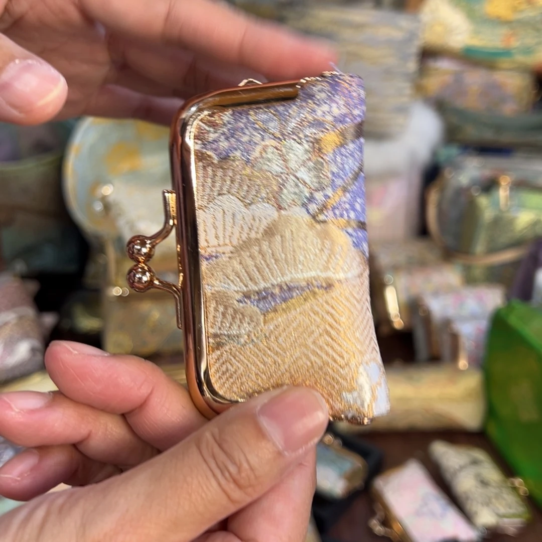 锦***e织绣指甲刀包口金福利