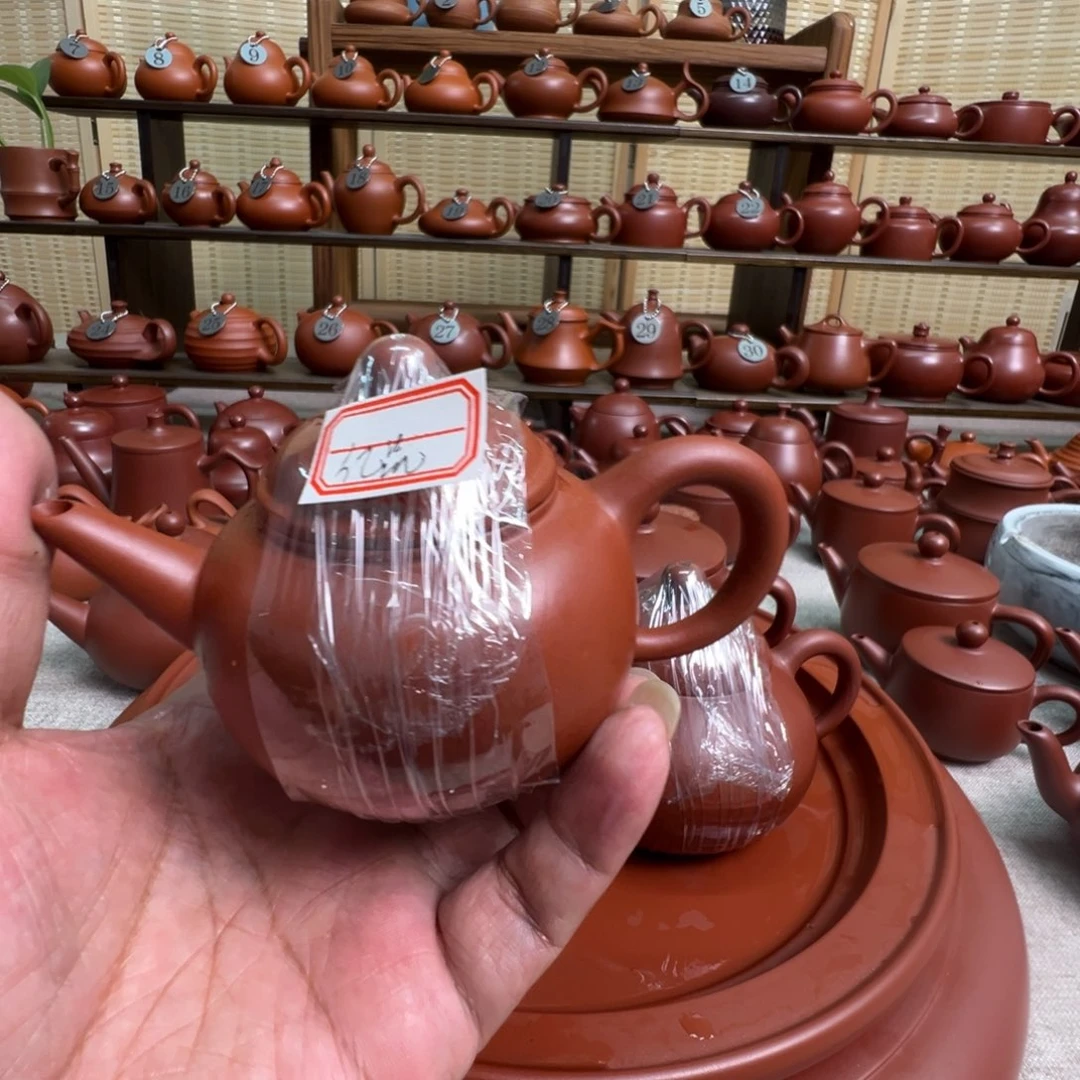 亿***店茶壶紫砂潮州手拉朱泥壶，微瑕不退换