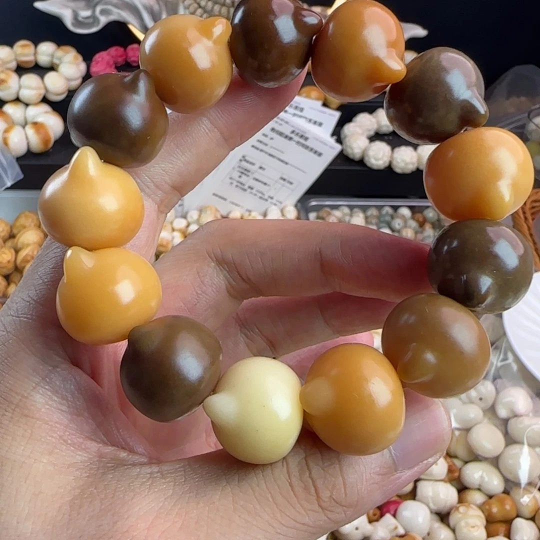 菩提根/象牙果吊坠瑕疵卡21菩提猫头手串一条