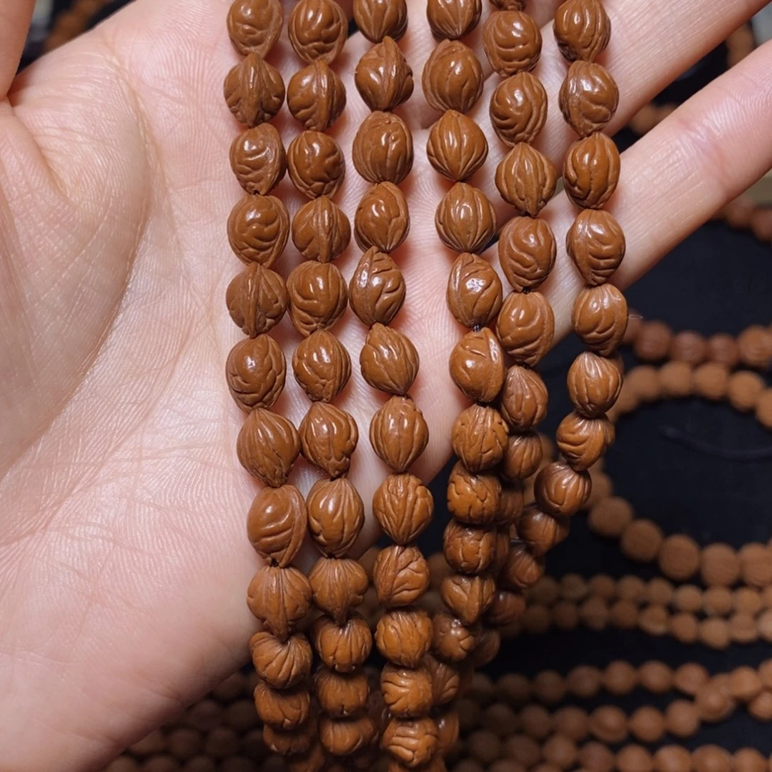 假***风手串桃核秦岭文玩桃核脖挂