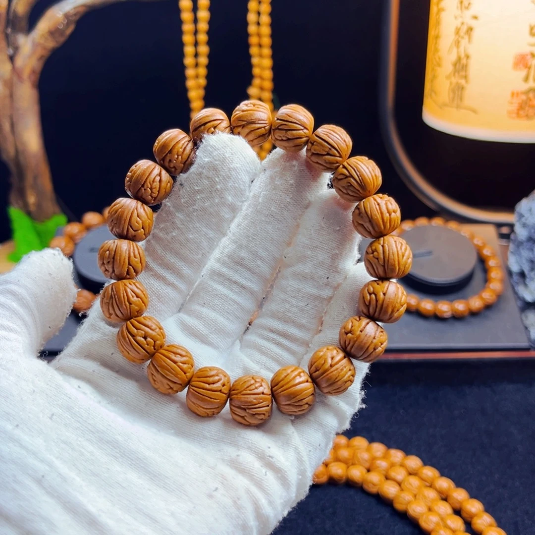 妞***火吊坠桃核野生桃核