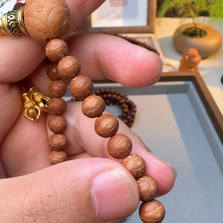 别***忆凤眼菩提吊坠大眼萌手持