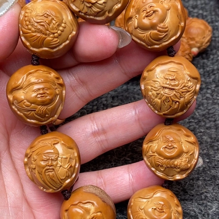 橄榄核吊坠哈喽咯哦兔磨磨唧唧
