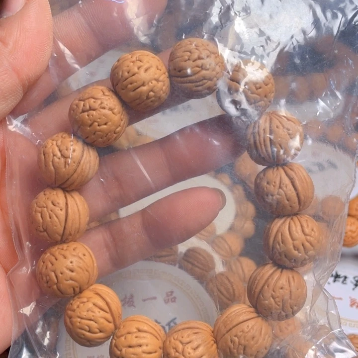 桃核吊坠M****g肉纹元宝