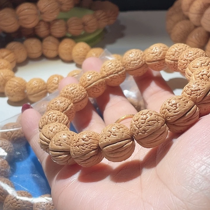 听***甜桃核吊坠桃核手串玲珑塔10