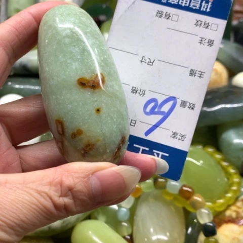 晴***里蛇纹石玉未镶嵌手把件