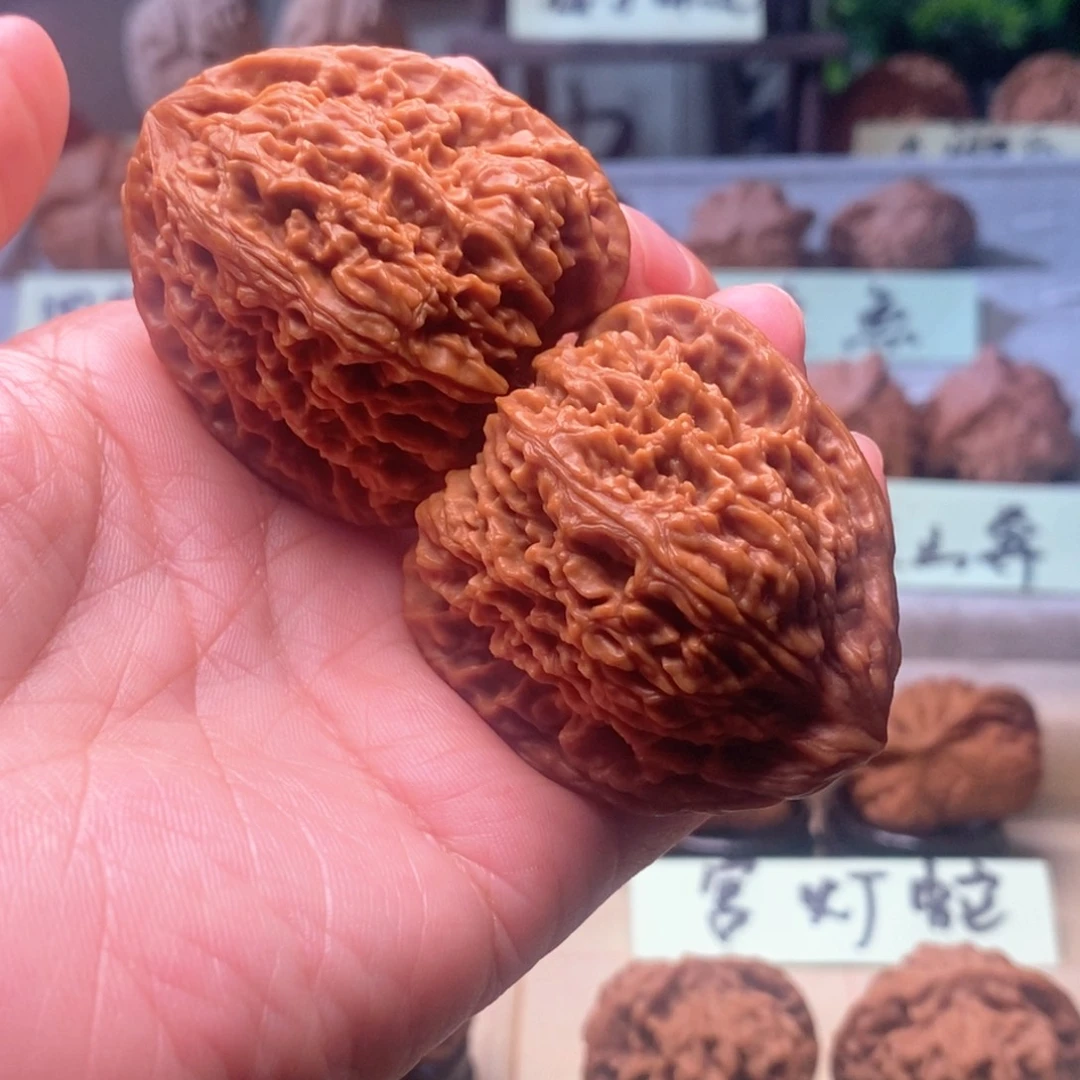 弹***嘣把件文玩核桃凹底三角疆