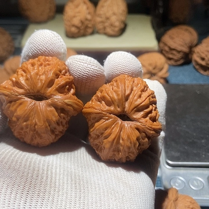 刘***淘文玩核桃吊坠元宝全品