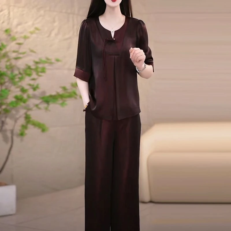 【店铺热销】高级冰丝缎气质上衣裤子时尚套装2025夏季新款遮肚显