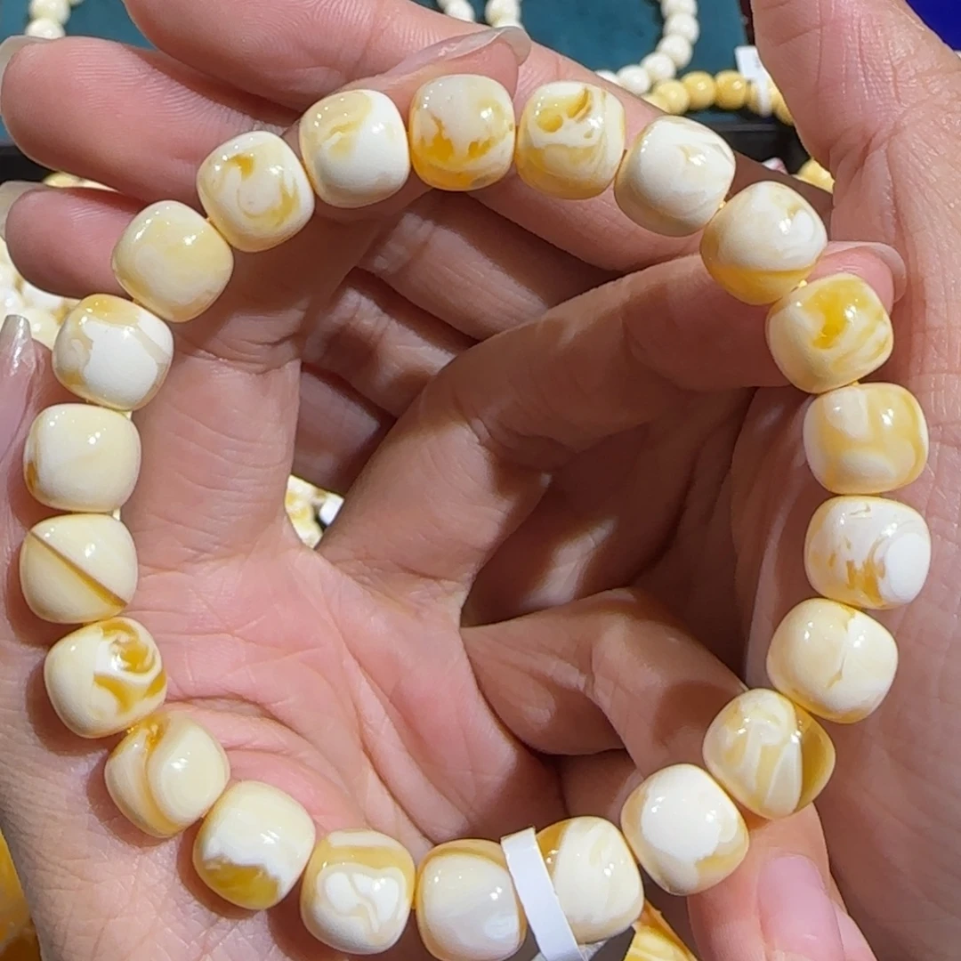 蜜蜡未镶嵌裸石同料焦皮橘粉溶洞手串