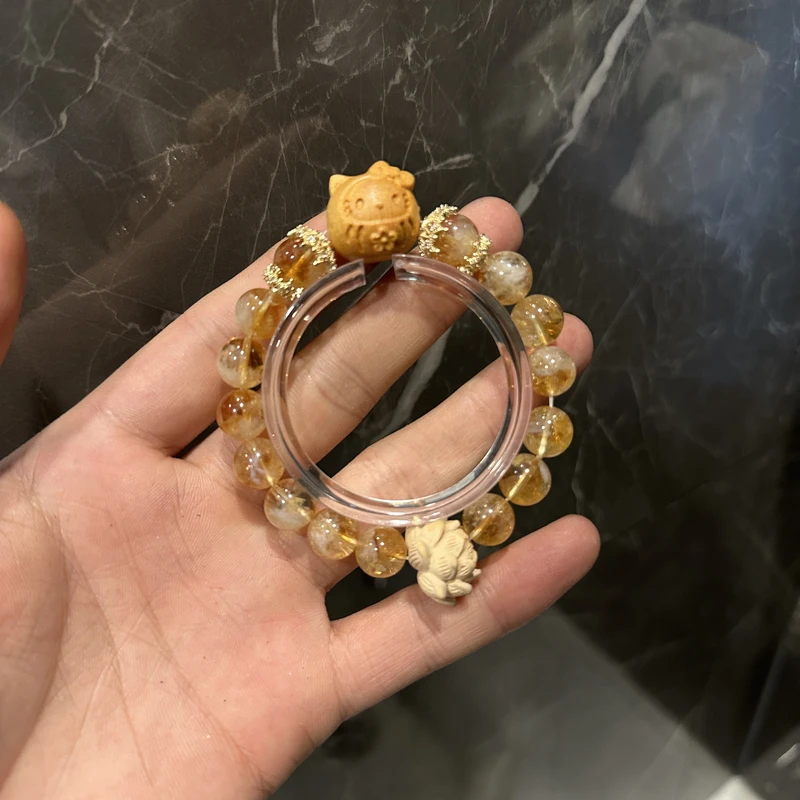 S117 水心宝 10mm黄阿塞达摩蛋设计手串