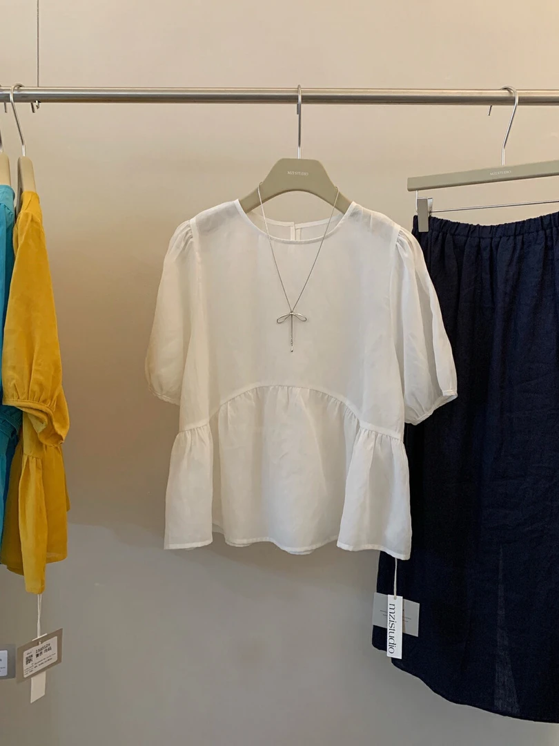 女士夏季宽松显瘦圆领荷叶边下摆可爱甜美气质短袖娃娃衫