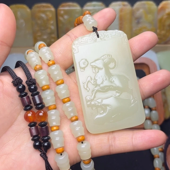 顾***昆仑山料方解石玉羊牌