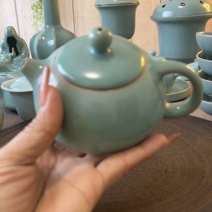 瓷片西施壶一一一一瑕