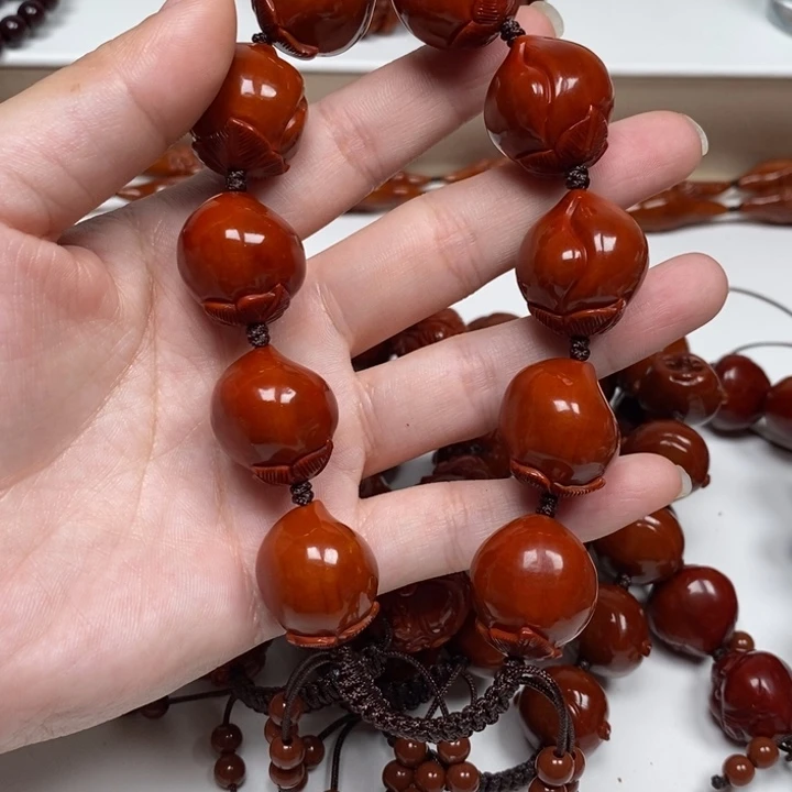 刘***，橄榄核雕刻工艺的发展
