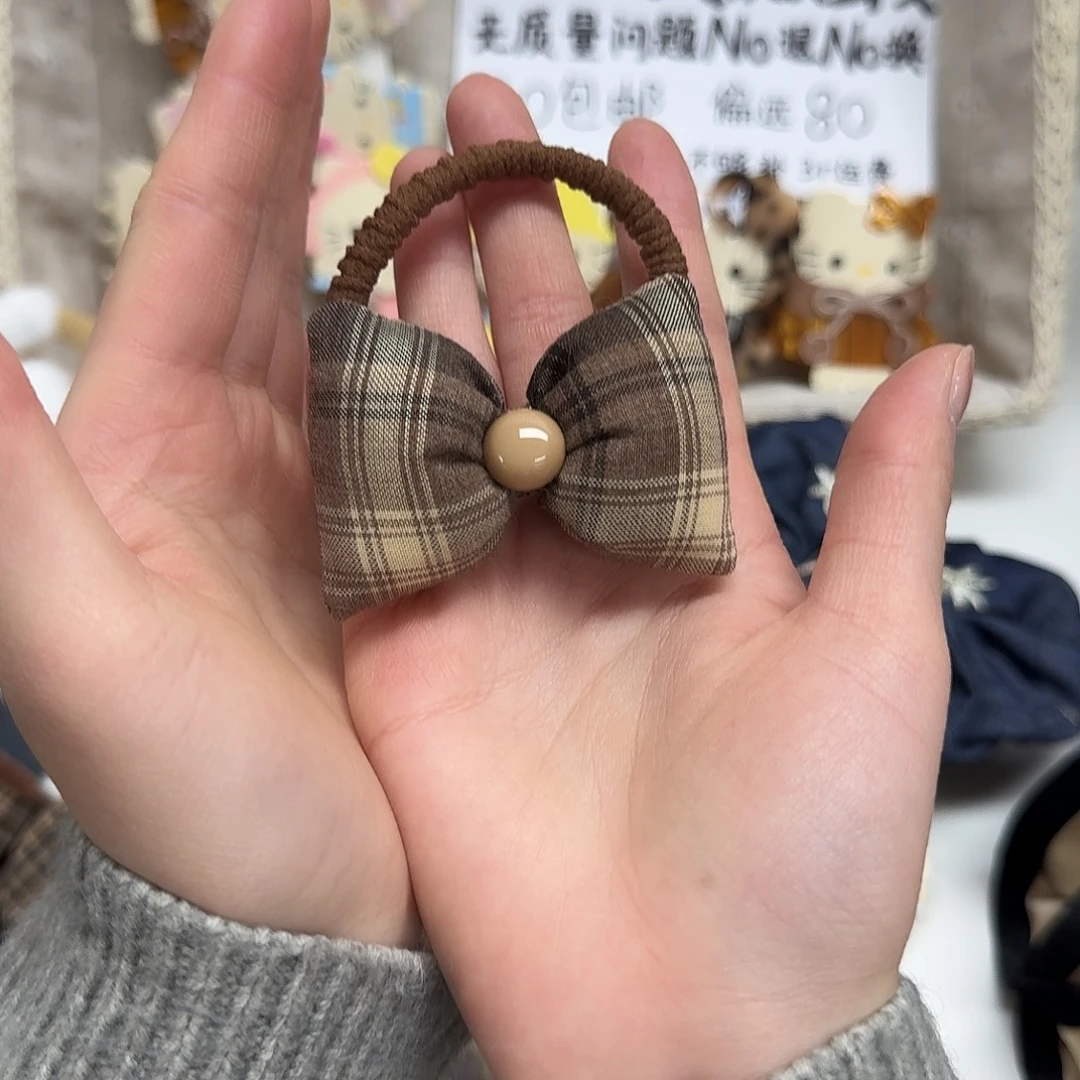 皮质非金属咖色海绵蝴蝶结