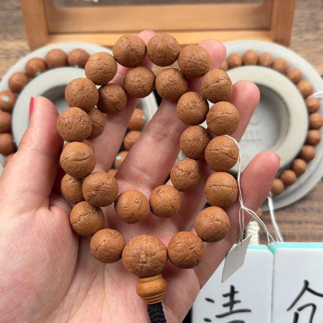 凤眼菩提吊坠27颗手持