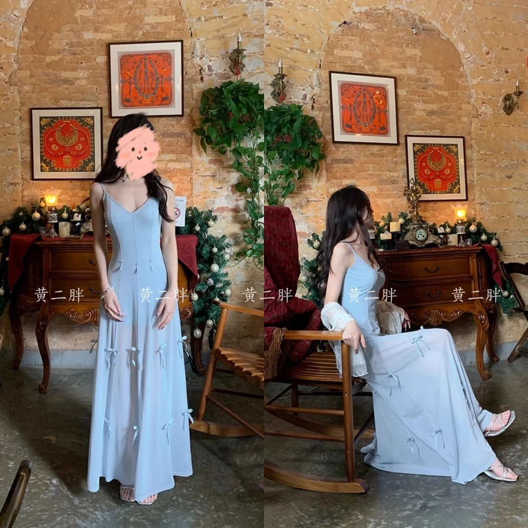 2025春夏季新款纯欲吊带连衣裙女别致绝美重工蝴蝶结长裙