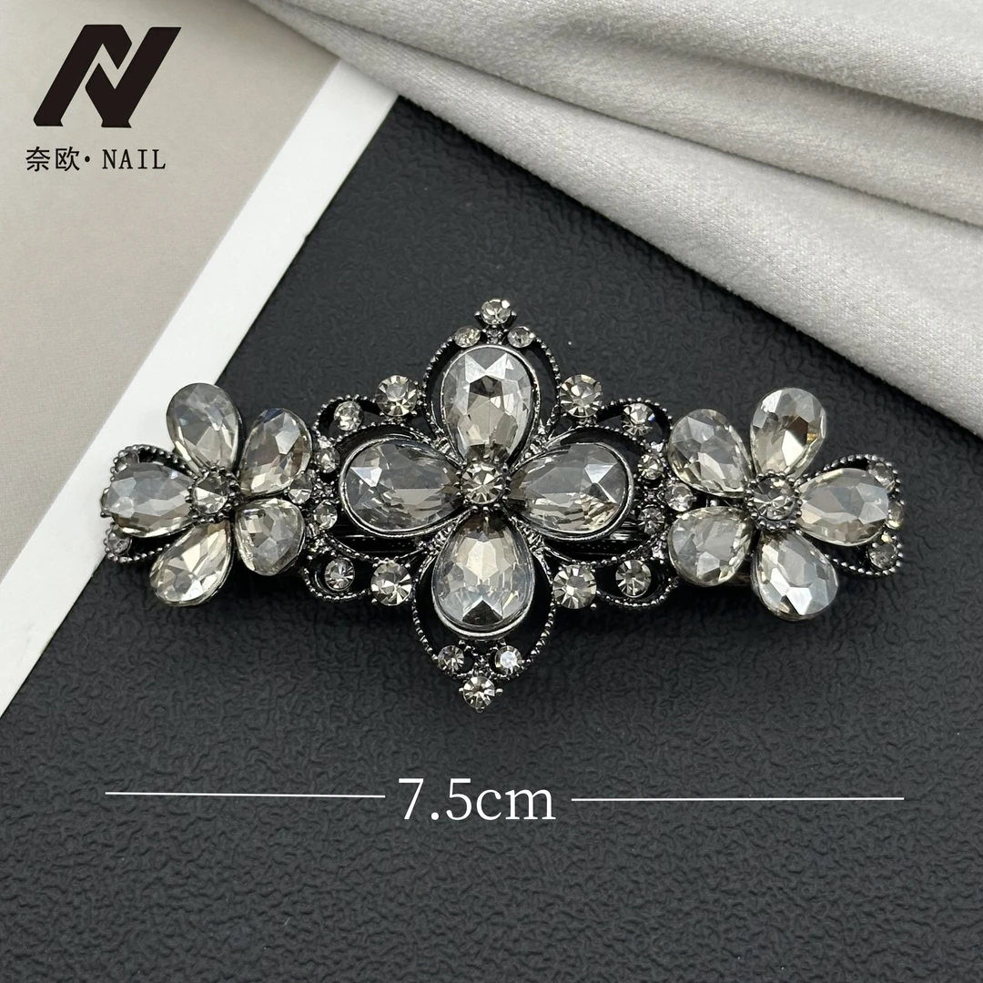 【NAIL·奈欧】设计师系列6123四叶草五瓣花满钻气质弹簧夹