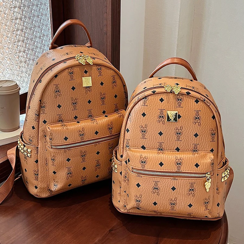 满印卡通双肩包pu面料防泼水大容量背包时尚百搭学生背包可放a4纸