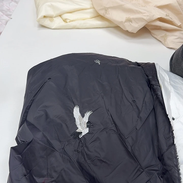 无纺布孤品羽绒服布料