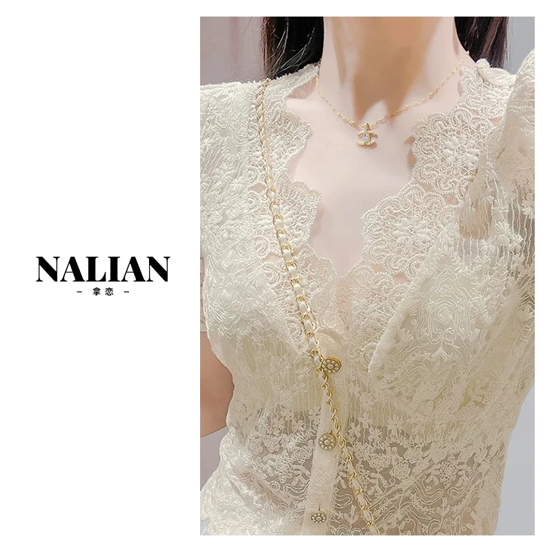 洋洋优选-春夏新款V领花边单排扣镂空设计内搭蕾丝开衫女 YY71367