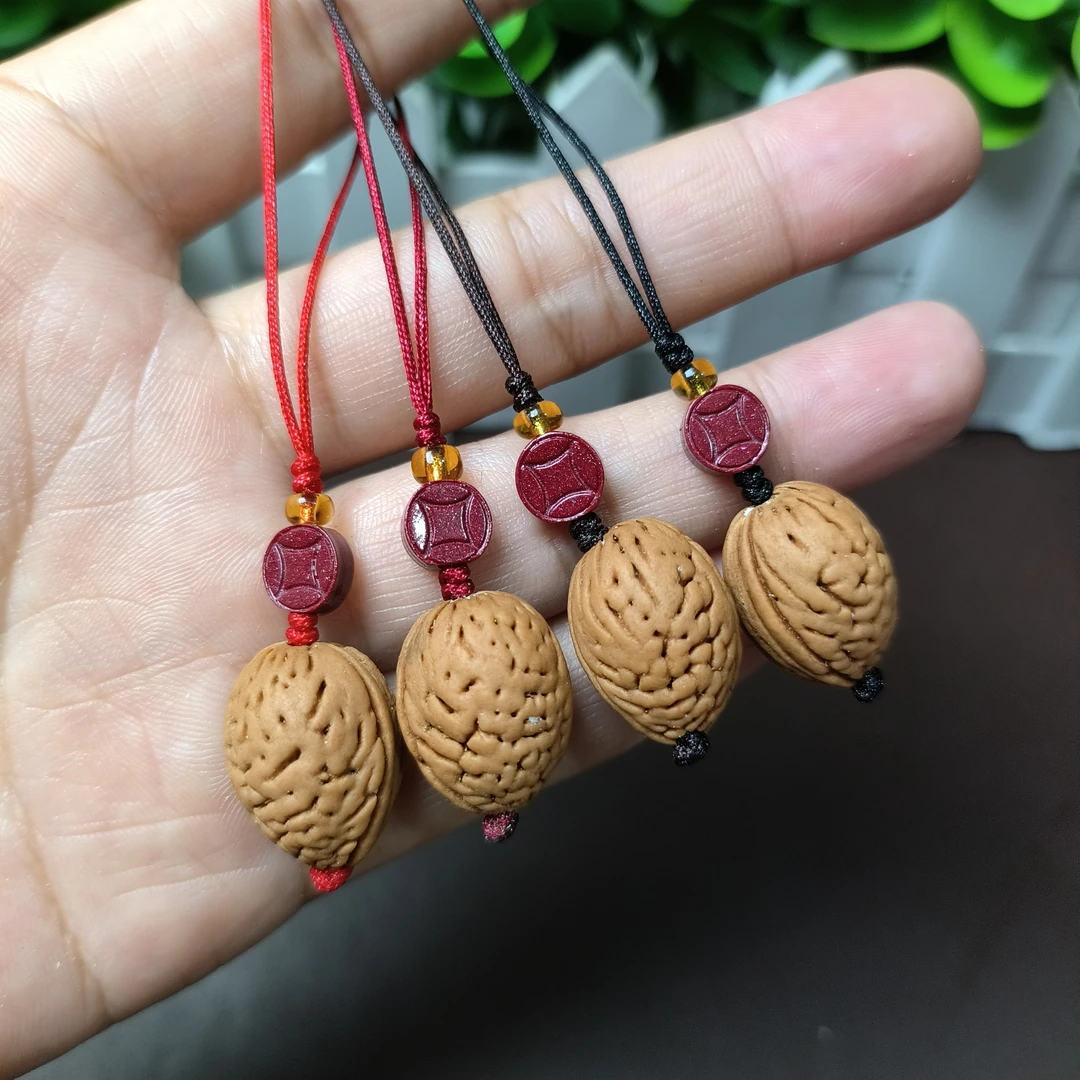 钱袋子野生脑纹山桃核编织平安朱砂男女随身手机链钥匙扣创意挂饰