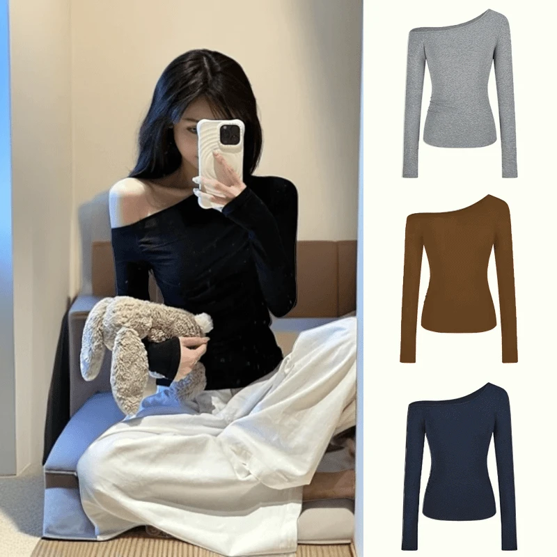 黑色斜肩长袖T恤女早秋新款辣妹掐腰修身显瘦一字肩别致露肩上衣