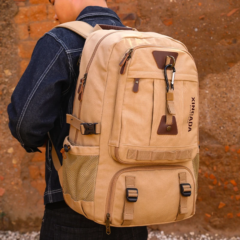 双肩包大容量男士帆布包休闲电脑包旅行出差户外运动多功能书包女