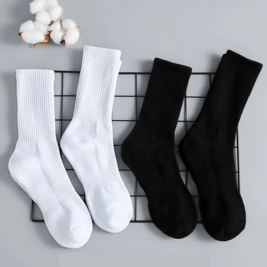 袜子男中短筒吸汗防臭黑白纯色棉女袜秋季运动潮流款学生四季长筒