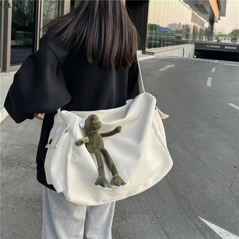 新款潮牌男女斜挎包帆布单肩包大容量上课上班上学通勤包包学院风