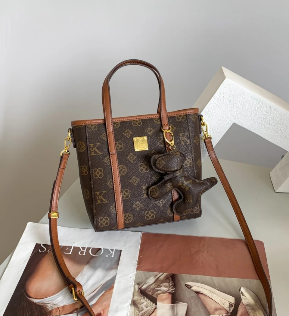 优库迪斯正品UK女包2025新款高级感通勤菜篮子手提包单肩斜挎包潮