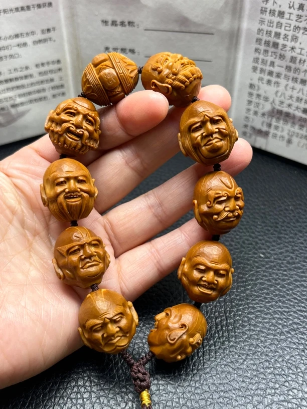 2.0铁核须派罗汉核雕