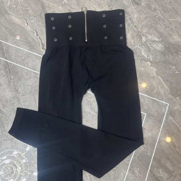 《乐姐》推荐新款高腰拉链打底裤038款，朵