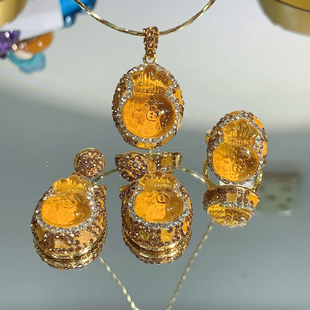 铜合金合成锆石吊坠 TTSD 黄色福袋雕刻时尚吊坠三件套 316