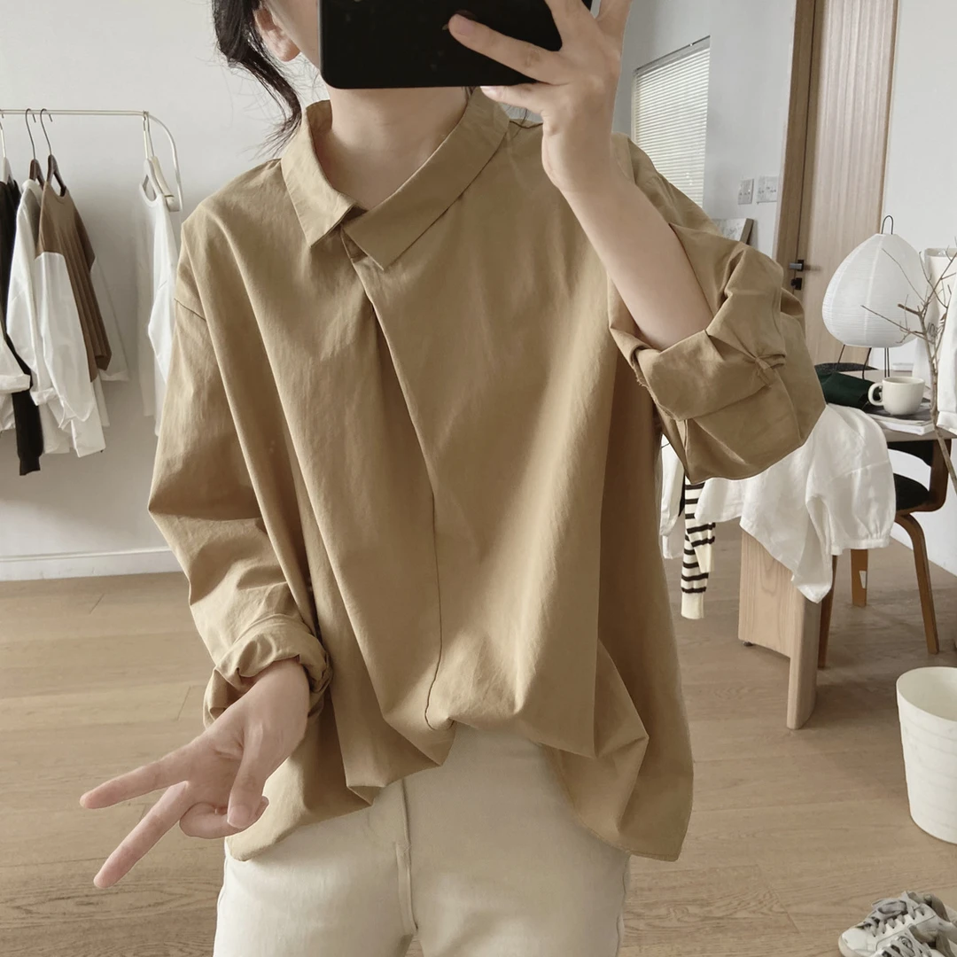 春秋新款宽松棉质衬衫女显瘦简约娃娃领长袖不规则小众设计感上衣