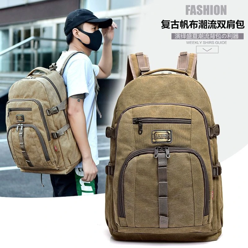 新款复古男士双肩包潮流纯帆布耐用户外背包女休闲旅行登山包加厚
