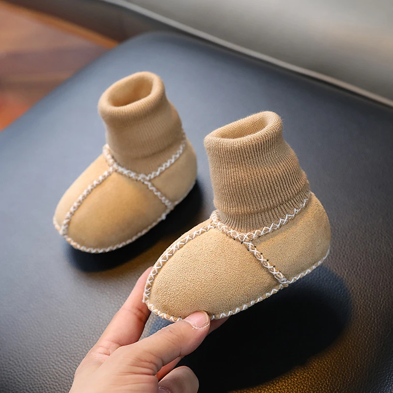 仿皮毛一体婴儿鞋袜保暖加厚秋冬款宝宝软底不掉袜套新生儿0-6-12