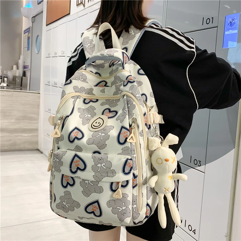 书包女初中生大容量中学生涂鸦少女双肩包大学生轻便减负高中背包