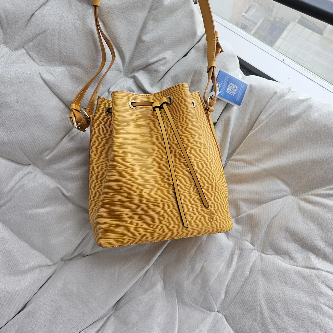 95新 LouisVuitton/路易威登 802196 LV黄色水波纹单肩水桶包