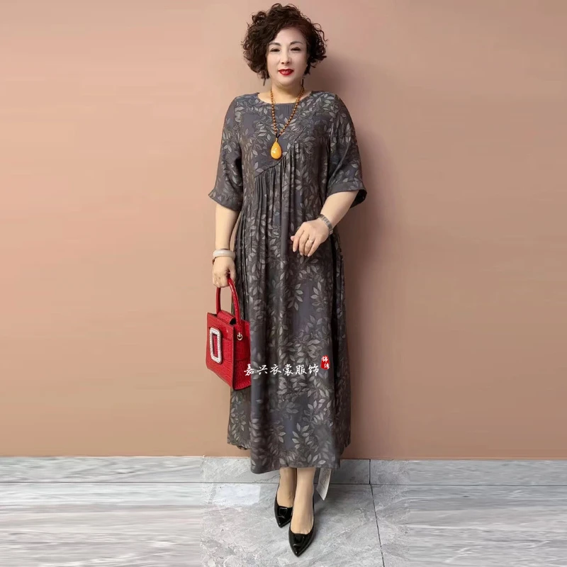 加肥加大码200斤连衣裙夏季新款阔版宽松遮肚显瘦时尚中长裙洋气