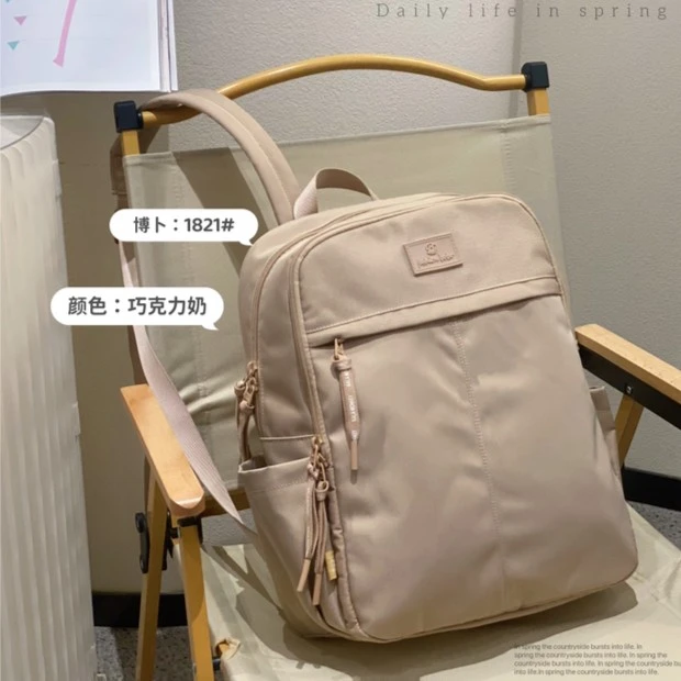 多口袋新款小众帆布包双肩背包斜纹防水大容量妈咪包学生休闲包