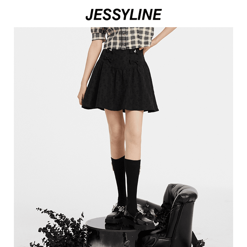 jessyline秋装女装 杰茜莱时尚蝴蝶结拼接半身短裙 214112202
