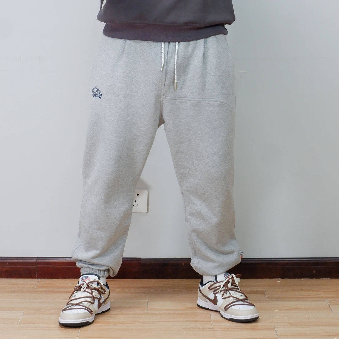 民生铺子【秋季优惠】春秋季纯色小标刺绣运动休闲裤男宽松九分卫裤