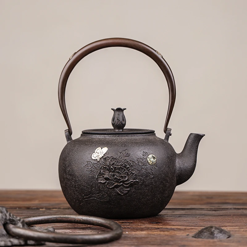 藏王堂落款砂铁纯手工 砂铁花飞蝶舞壶 家居煮茶器铁壶