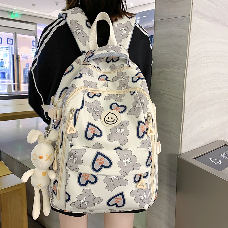 书包女初中生大容量中学生涂鸦少女双肩包大学生轻便减负高中背包