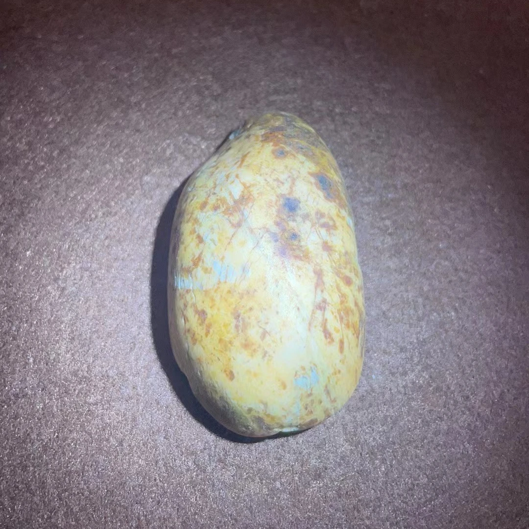 手把件奇石黄色晶体