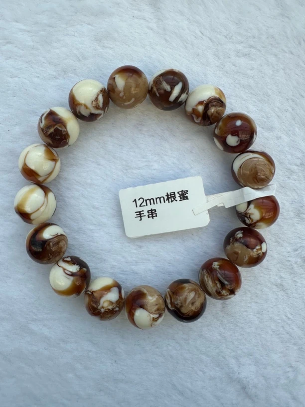 W062古巴新蜜根蜜手串12mm