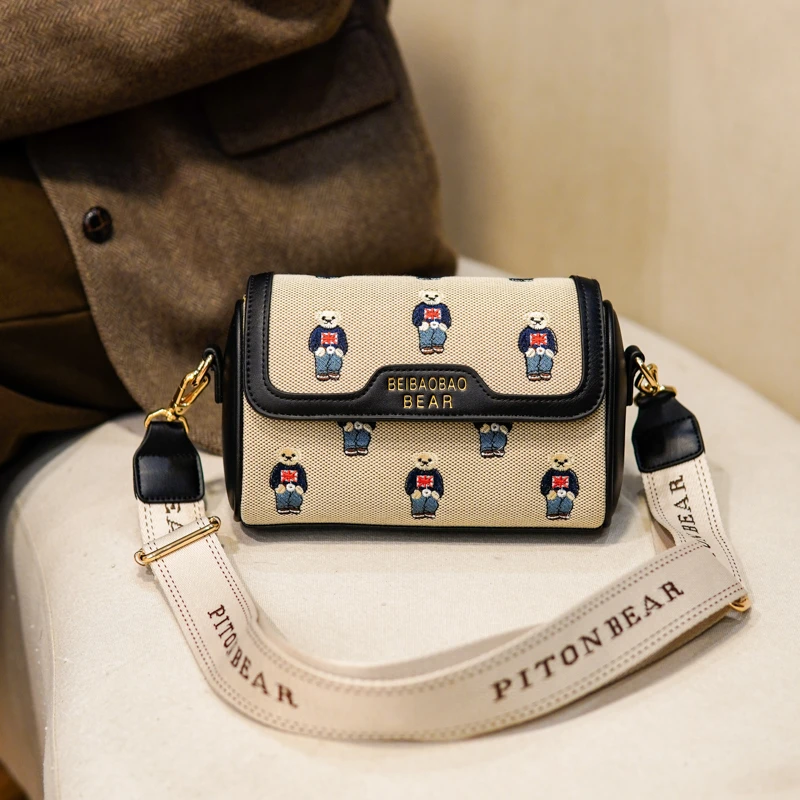 北包包提花刺绣枕头包小众设计包包女新款宽肩带单肩斜挎包圆筒包