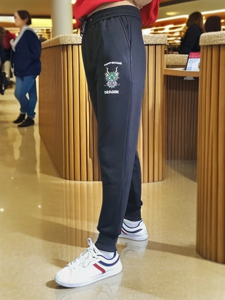 秋冬新款高端轻奢男士刺绣长裤时尚百搭休闲情侣卫裤龙头小脚潮裤